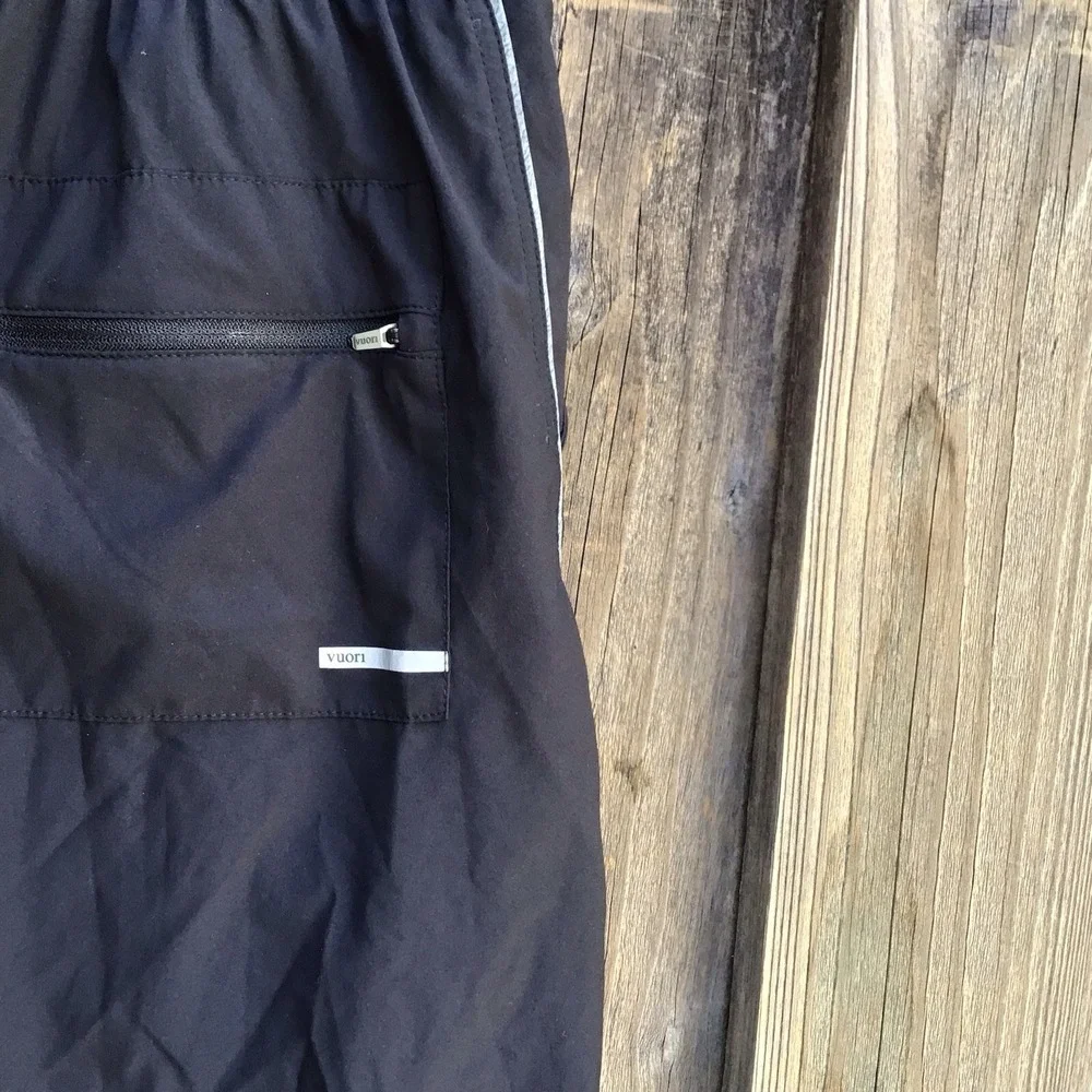 Vuori Black Athletic Shorts with Light Gray Drawstring